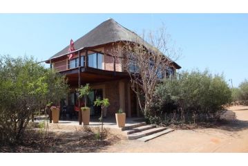 Baobab - NUDE - SunEden Family Naturist Resort Accomodation, Pretoria - 2