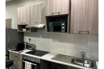 Lovely 1 bedroom apartment with unlimited Wi-Fi Apartment, Johannesburg - 1