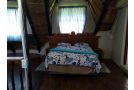 Thatched roof 4 bedroom house air-conditioned Guest house, Graskop - thumb 9